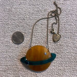 Tatty Devine amber and green planet necklace